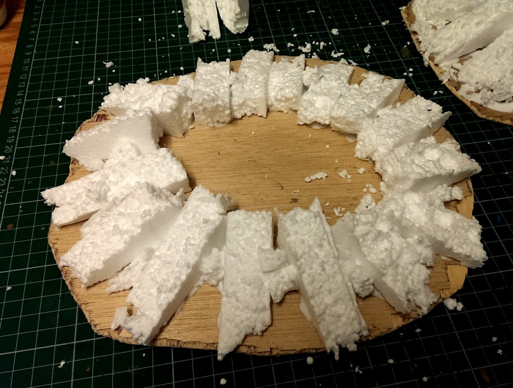 Using some PVA glue, stick down some angled polystyrene